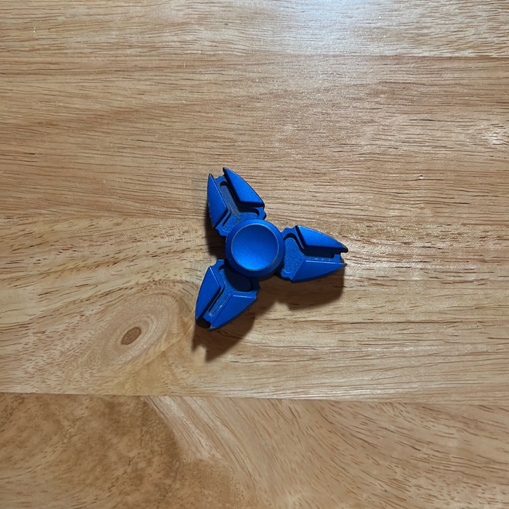 Blue fidget spinner.